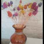 Vase with dried plants