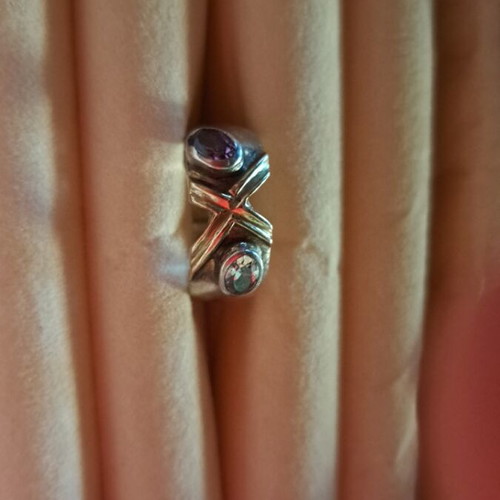 Silver ring like new with gold double X and amethyst, zircon stones