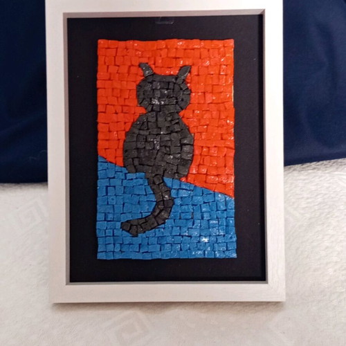 Mosaic framed artwork with black cat design
