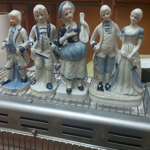Victorian Era Figurines like new, set of 4 pieces