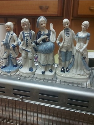 Victorian Era Figurines like new, set of 4 pieces