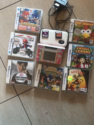 Nintendo DS Lite като нов с 8 игри, зарядно и стилус
