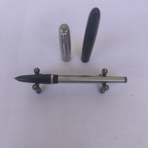Parker 51 pen used with stainless steel cap and black resin body