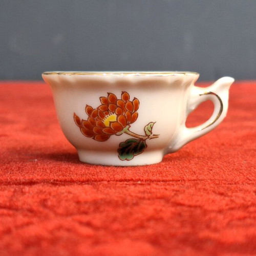 Japanese porcelain cup used with hand-painted chrysanthemum
