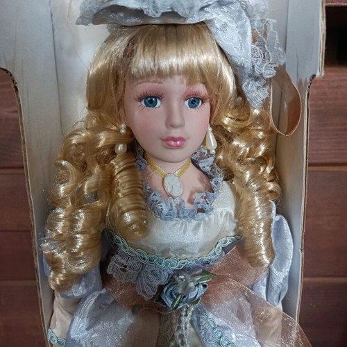 Porcelain doll with stand new, vintage style