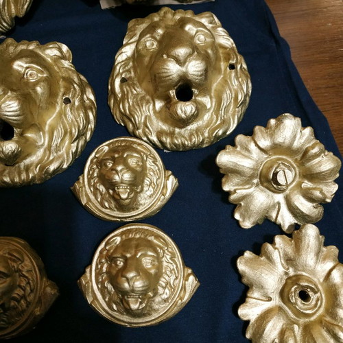 Decorative items used, cast iron lion heads, old antiques