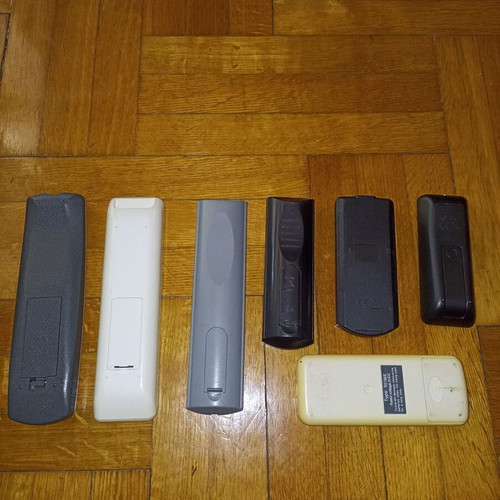 Set of 7 different TV remote controls