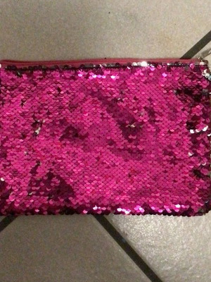 Toiletry bag with sequins used