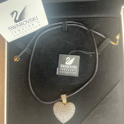 Swarovski necklace with heart pendant like new, white stones