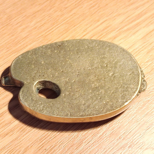 Brass paperweight with painting palette theme like new