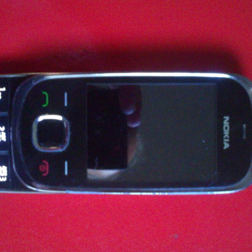 Nokia 7230 used for spare parts with original charger