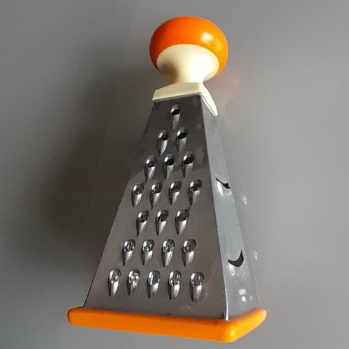 Cheese and vegetable grater used