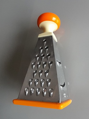 Cheese and vegetable grater used