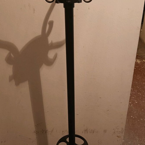 Coat hanger used with plastic hooks and weighted base