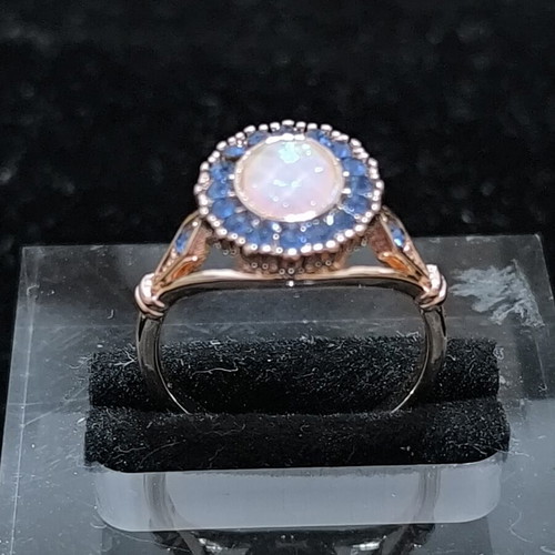 Rose Gold women's ring with white opal and blue crystals, stainless steel
