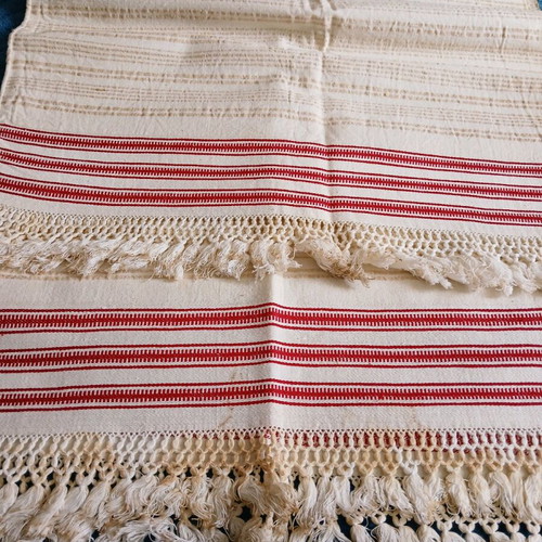 Woven tablecloth like new with hand-tied fringes