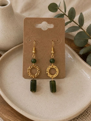 Earrings new with gold details and green beads
