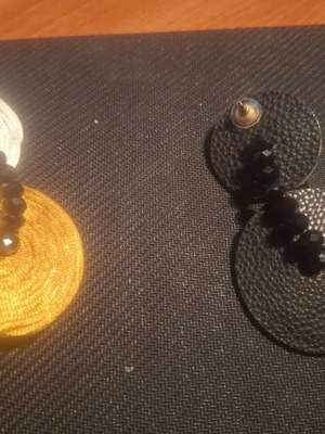 Dangling earrings like new in gold and silver tones