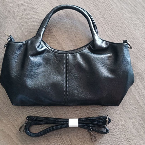 Handbag new with strap, black synthetic leather