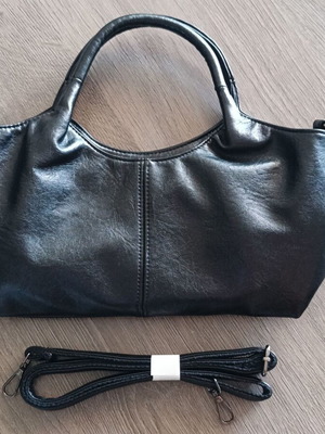 Handbag new with strap, black synthetic leather