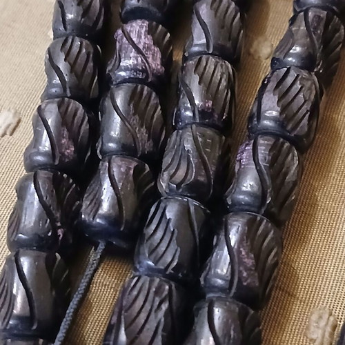 Komboloi bone engraved worry beads used with metal elements and tassel