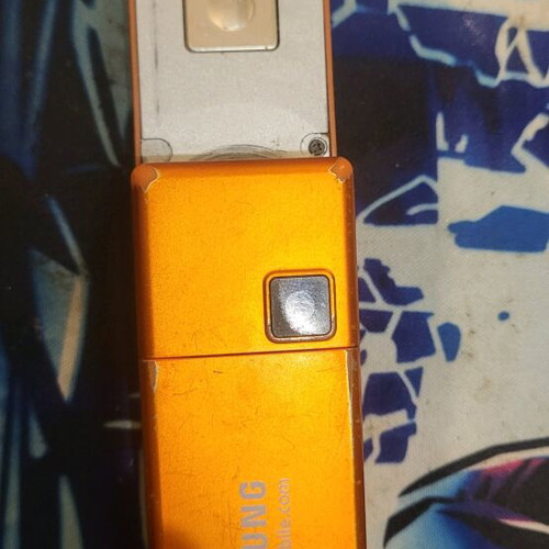 Samsung SGH-X830 used orange phone with charger