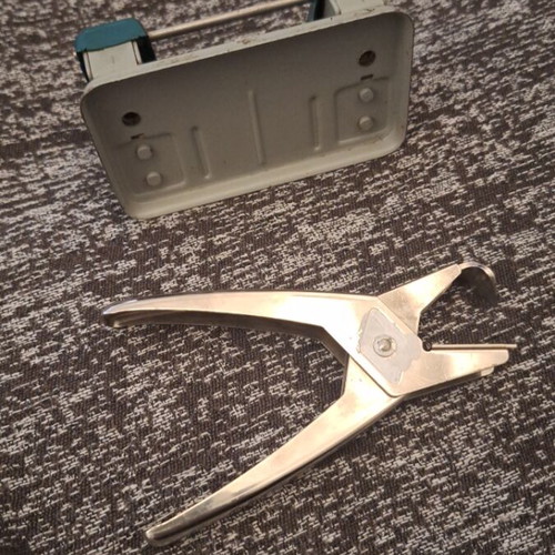Perforator and staple remover used, functional