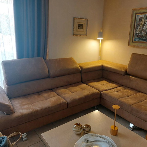 Corner sofa with stain-resistant fabric like new