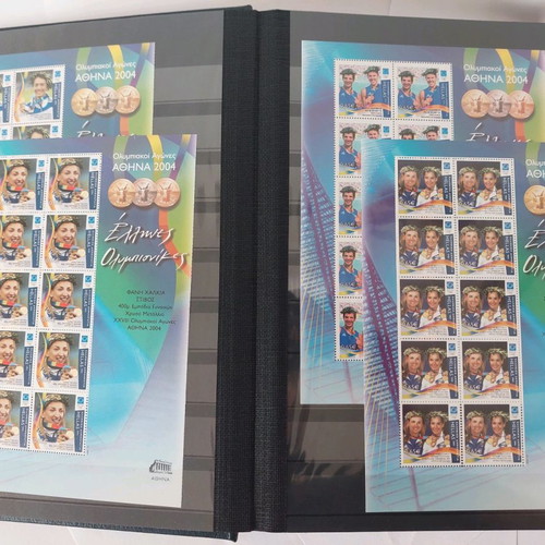 Leuchtturm stamp album with unused 2004 Olympic Games stamps used