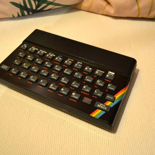 Sinclair ZX Spectrum 48K console used with accessories and manuals