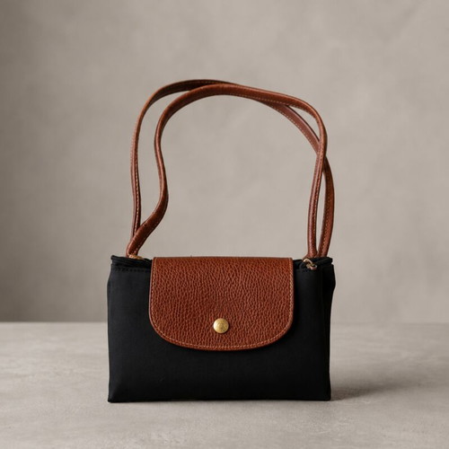 Foldable practical shoulder bag, black with brown details