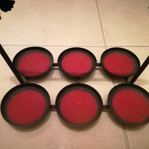Metal candle holder for six tealights used