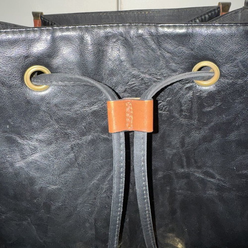 Bartuggi vintage leather shoulder bag black with brown details and gold buckle like new