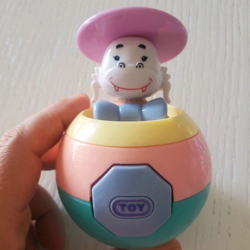 Baby toys ball and horn like new in pastel colors