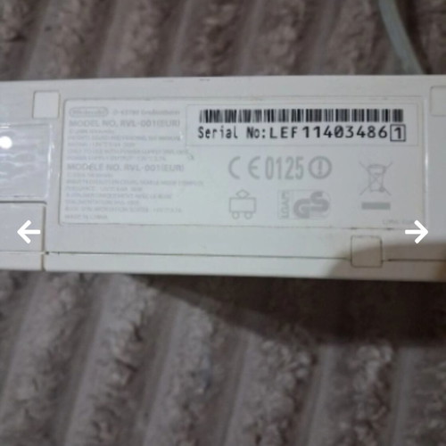 Nintendo Wii RVL-001 console with controllers and power supply