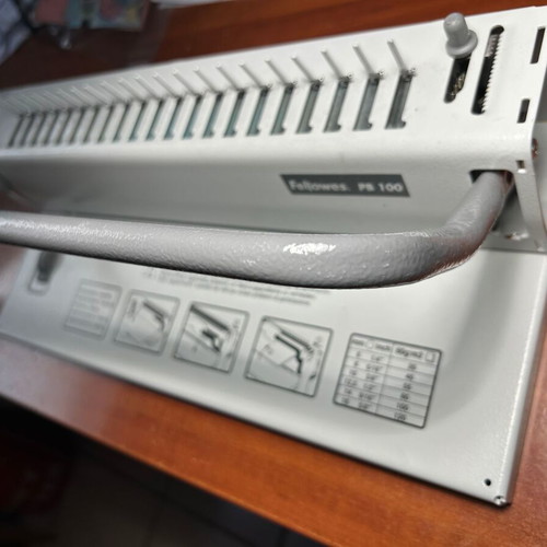 Fellowes PB100 binding machine used, 7-sheet punching, 16mm spiral
