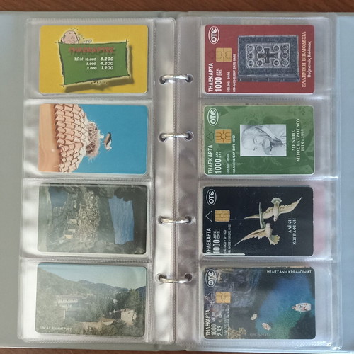 Phone card collection used, 42 pieces with album