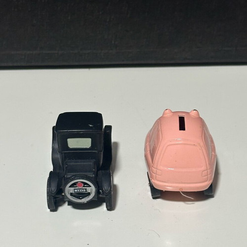 Disney Cars diecast metal toy cars set of 2 like new (black & pink)