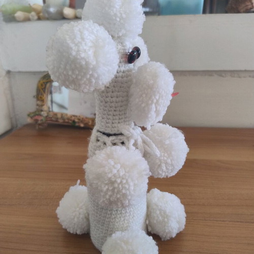 Faber champagne or wine bottle with knitted white dog