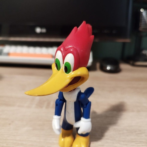 Mickey Mouse and Woody figures like new