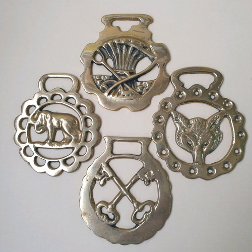 Authentic brass horse medallions set of 4 like new