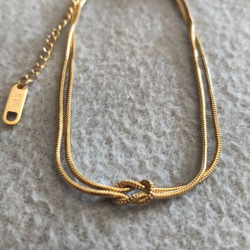 Infinity knot bracelet new, gold color stainless steel