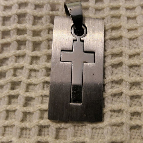 Pendant with steel cross like new, silver color