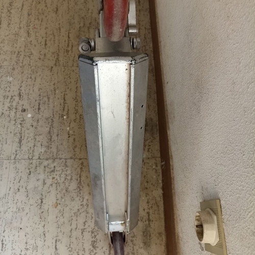 Silver metal scooter used, lightweight and foldable