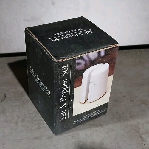 Porcelain salt shakers new in packaging