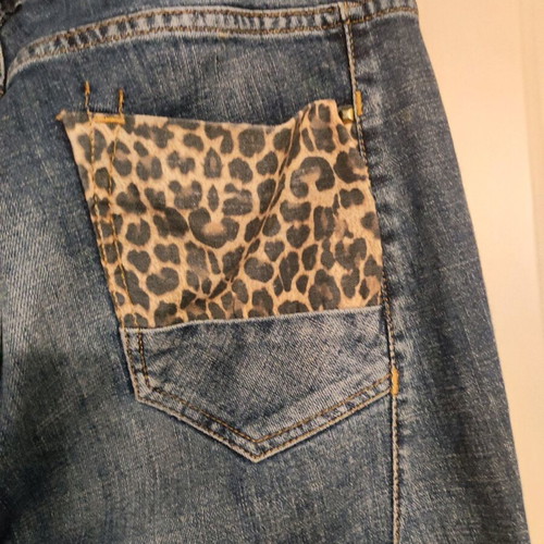 Lynne women's jeans like new with animal print and patches, size L