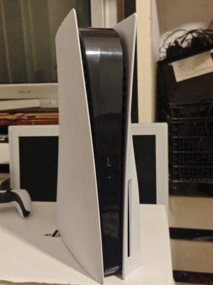 PS5 disc edition console with FC 25 game