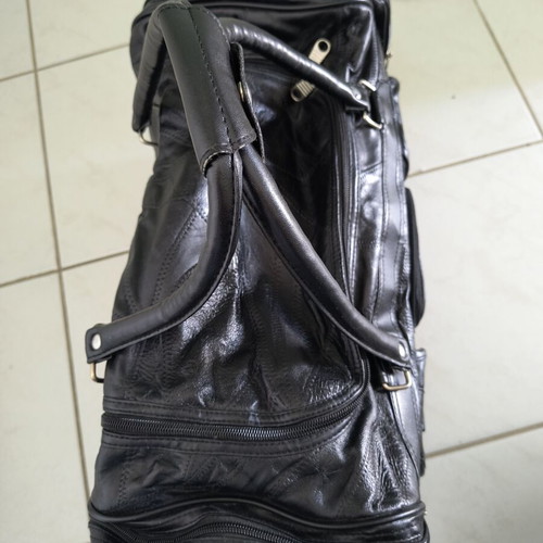 Travel bag like new, black, synthetic leather with extra strap