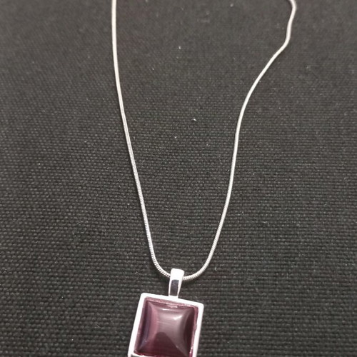 Jewelry set new, purple stone and silver pendant and earrings