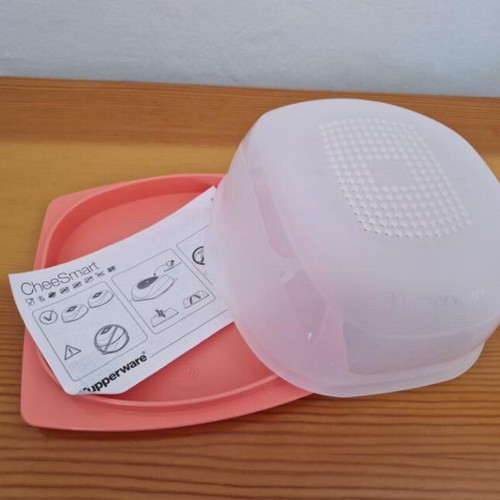 Mini Tupperware cheese container in peach color new